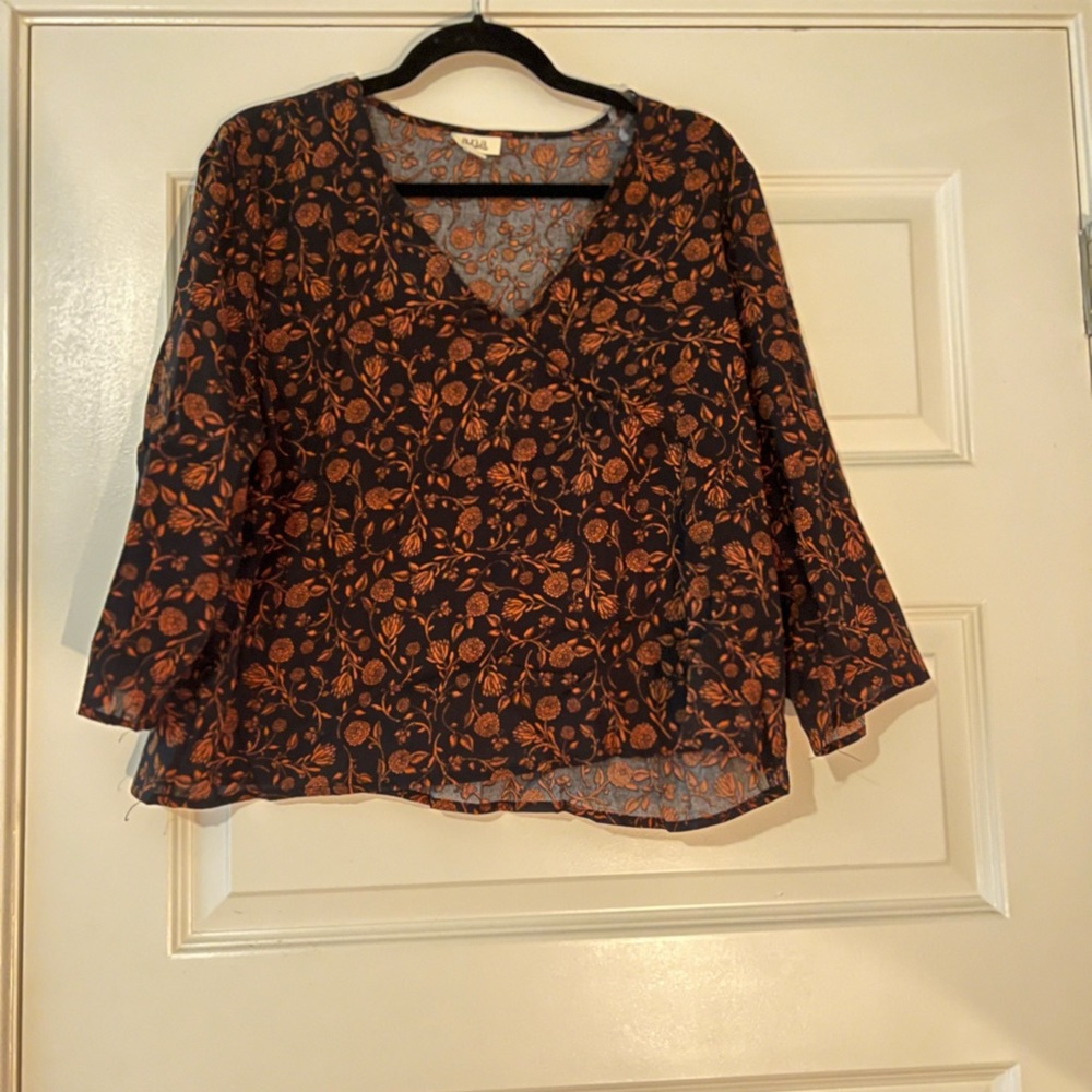 Black and orange blouse. New with tags!